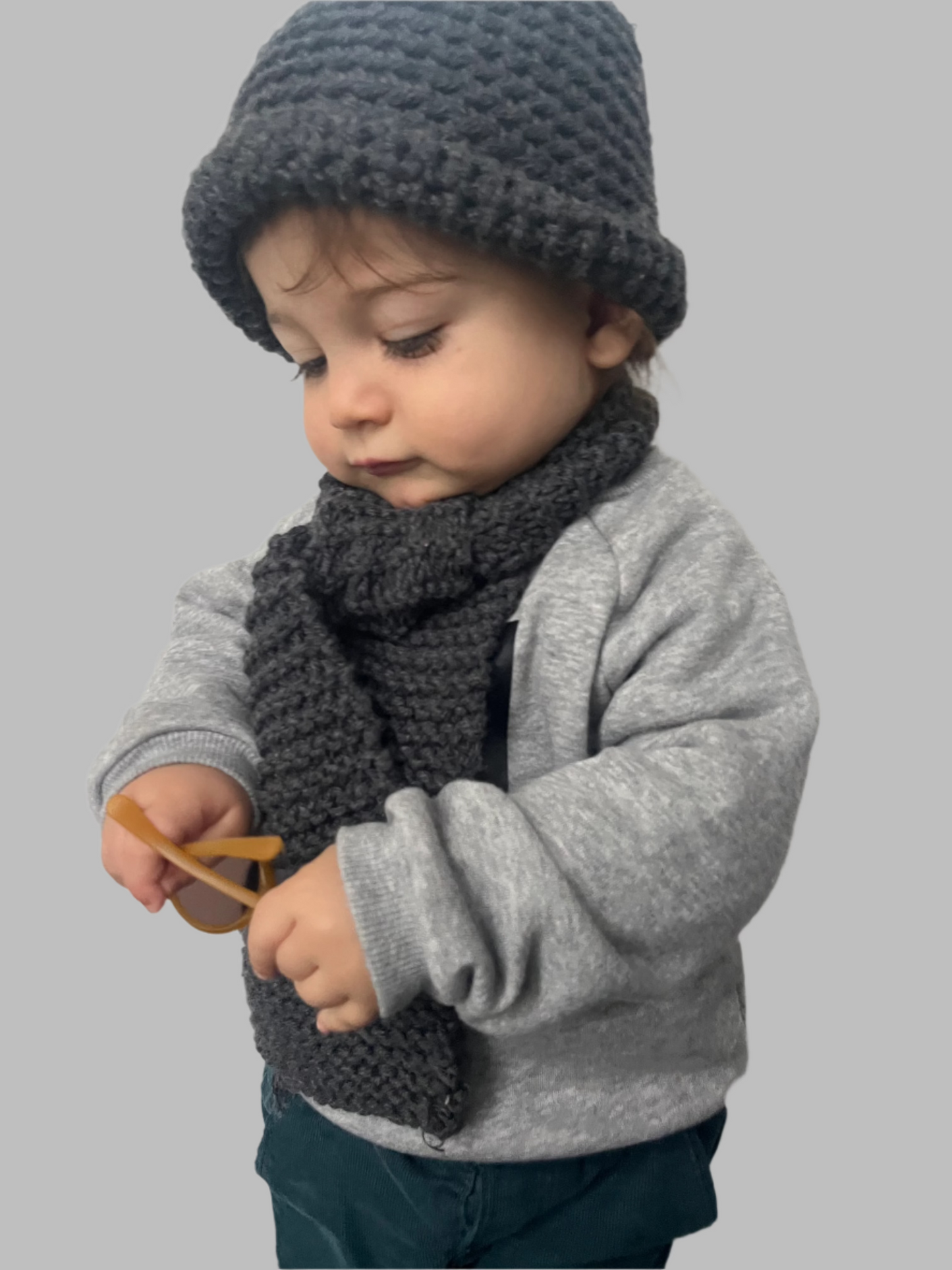 Hand-knitted wool scarf for baby